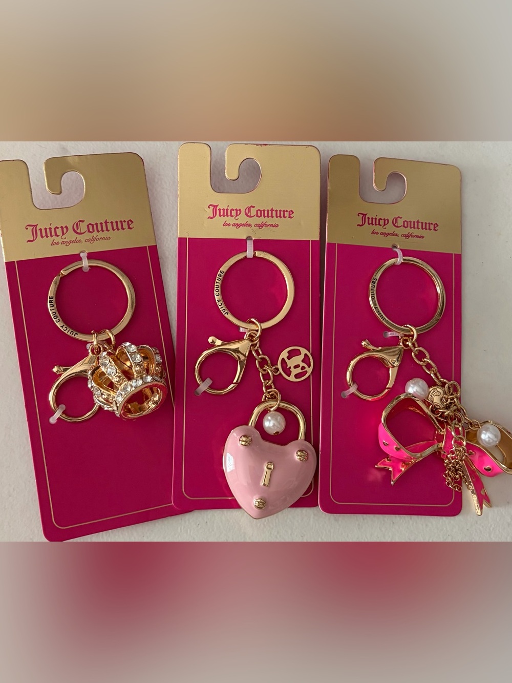 Juicy Couture Gold-tone Keychain Charm Trio with Pink Accents